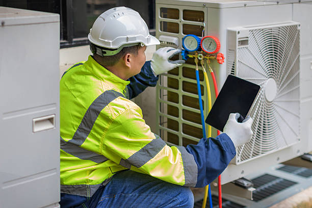 Professional Heat Pump Repair technician working in Gilman, IL
